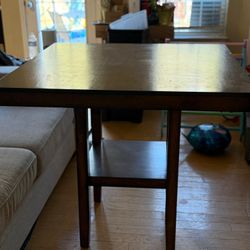 Dark brown counter height table and 4 chairs