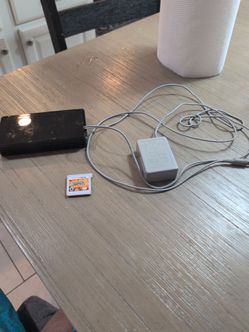 Nintendo 3ds plus charger and pokemon ultra sun