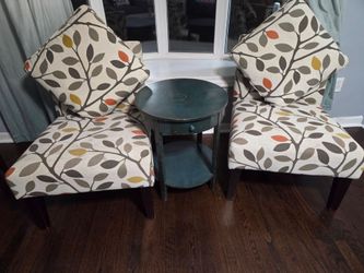 Pair of Upholstered Accent Chairs with Pillows and table