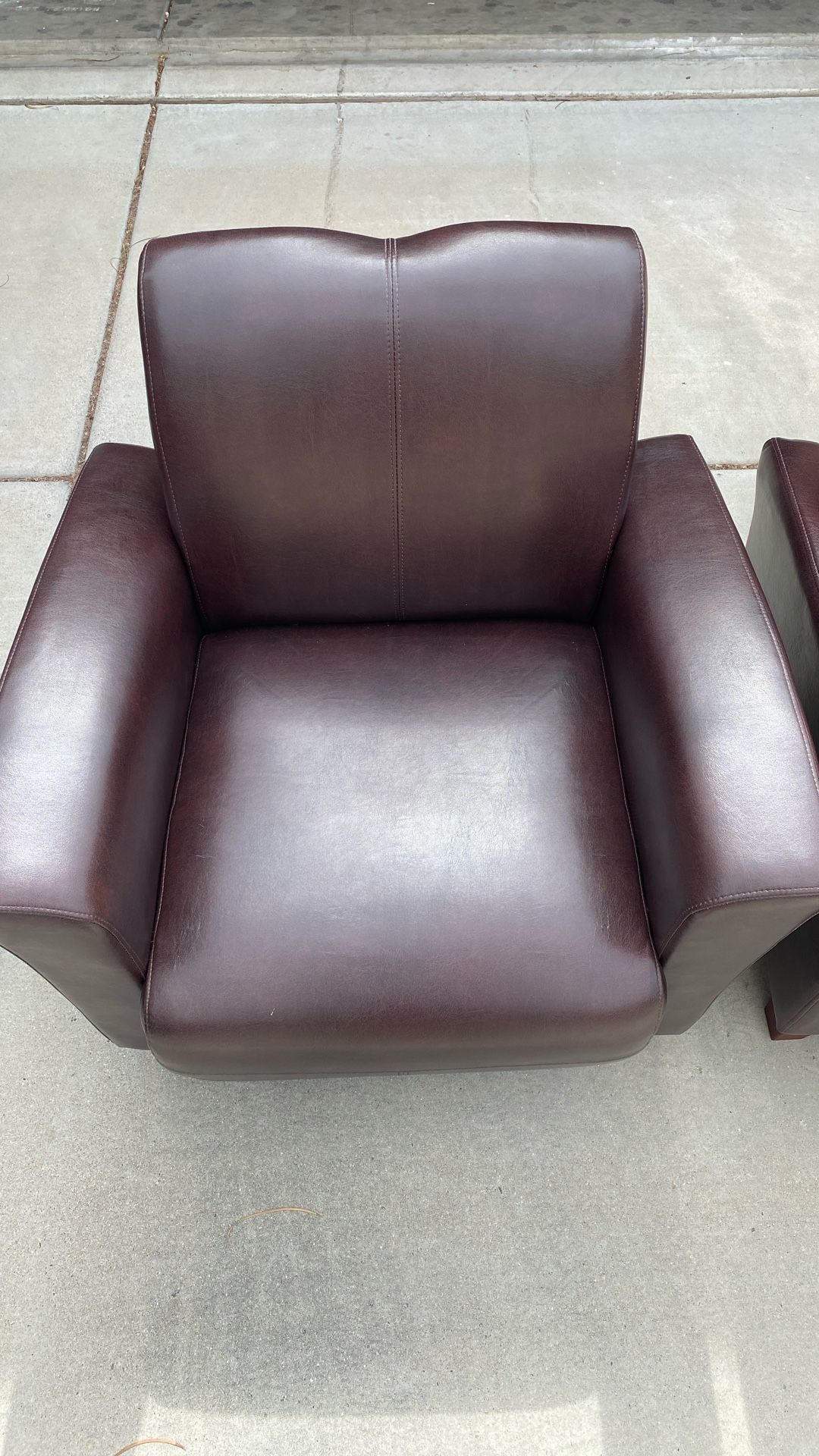 Pair Of Leather Armchairs
