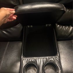 Black Loveseat leather reclining couch with storage