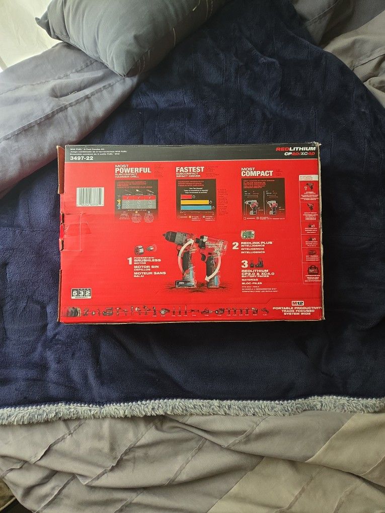 Brand New M12 FUEL Milwaukee Hammer Drill Driver and Impact Driver Batteries Included