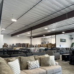 Couches, Loveseats, And More Lining Room Furniture!