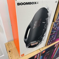 New JBL Boombox 4 speakers. These are awesome portable Bluetooth speakers. Has up to 28 hours playtime, plus 6 hours with boost. Super durable, IP68 w