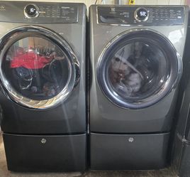 Electrolux washer and electric dryer with pedestals