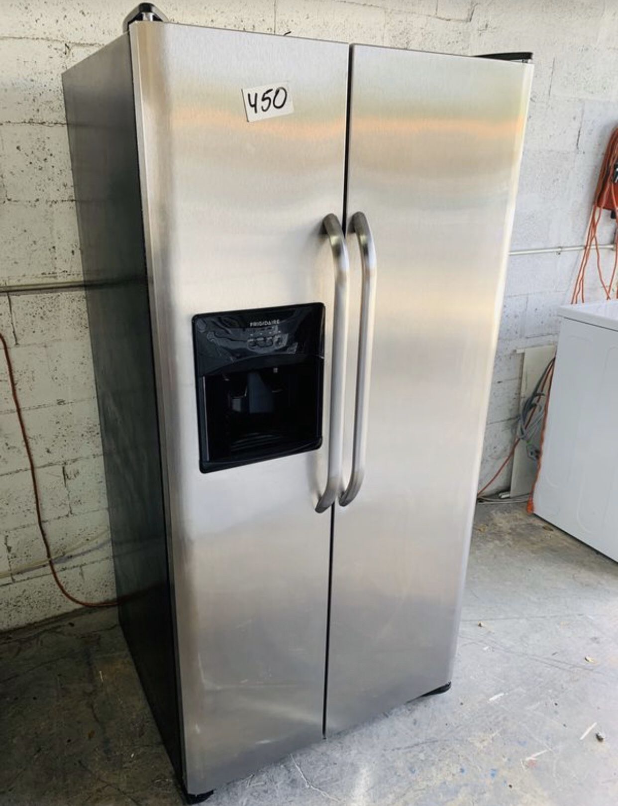 Frigidaire stainless steel refrigerator 33” wide in perfect condition and 6 months warranty. We have delivery service available