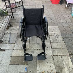 Wheelchair With Footrest In Working Order 