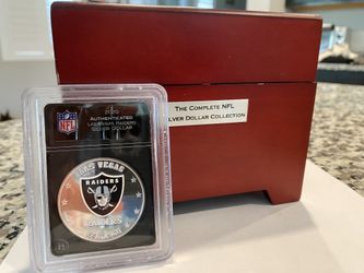 Raiders authentic silver dollar