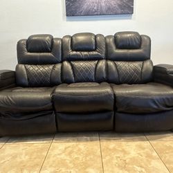 Brown Leather Power Reclining Sofa with Drop Down Table. 