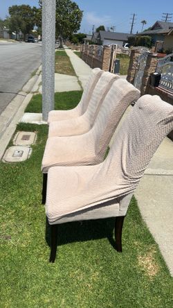 4 dining table chairs with covers