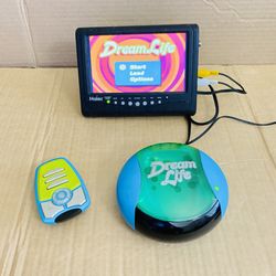 Vintage Hasbro Dream Life Plug and Play w/ Remote Control 2005 Tested And Works. The Remote works perfectly. Well maintained and works. The console ha