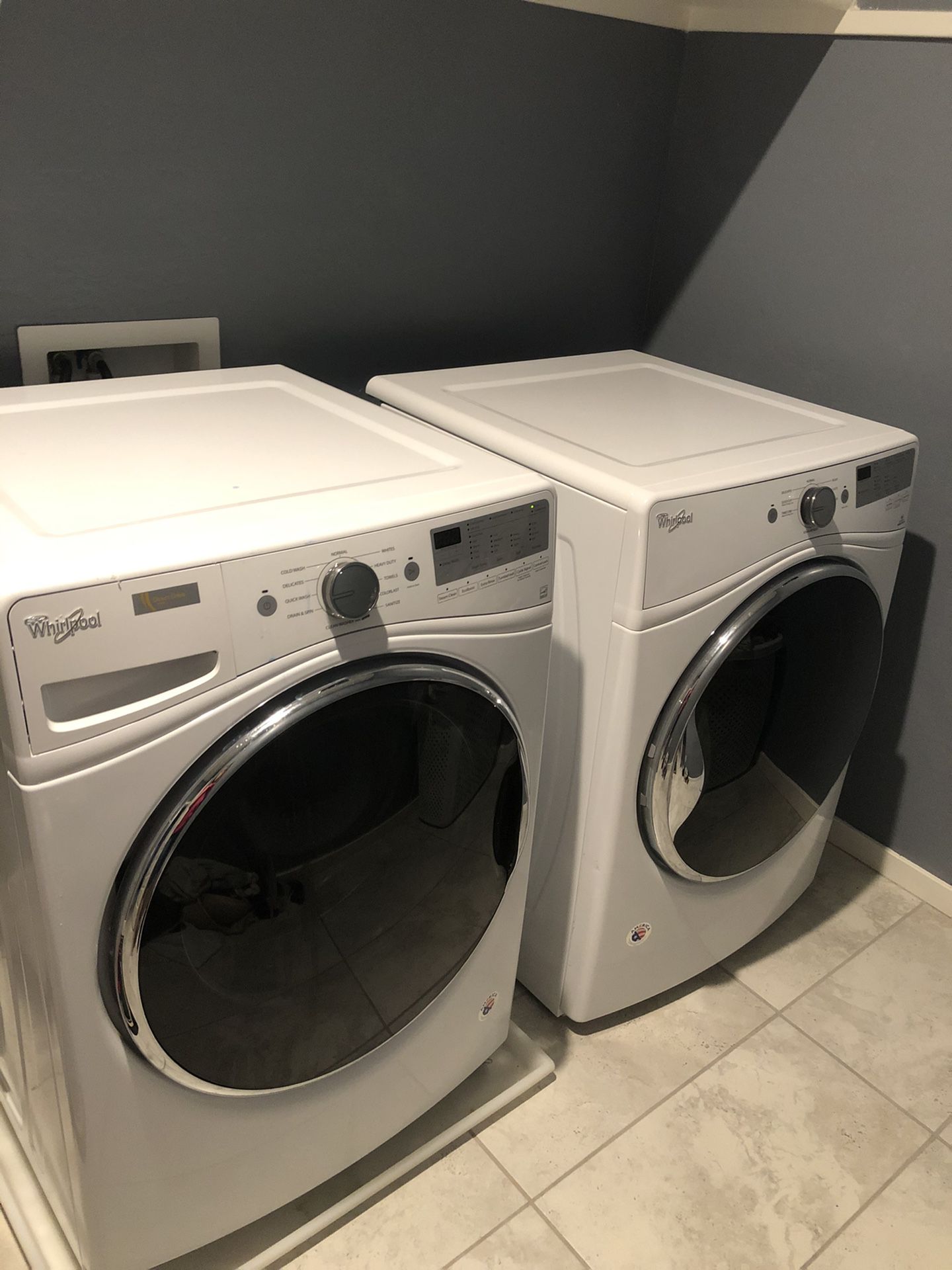 Whirlpool Washer and Electric Dryer.