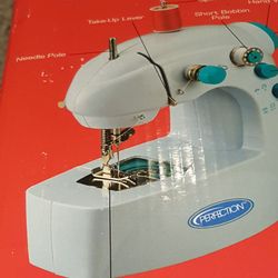 Mini sewing machine - never used