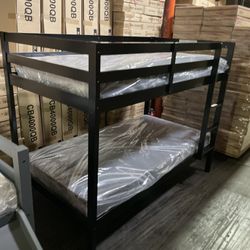  Twin espresso bunk bed. Assembly required. Assembly not included. Tax included. Free delivery.   Bunk bed only-$240  Bunk bed with 2 twin 6” thick fo