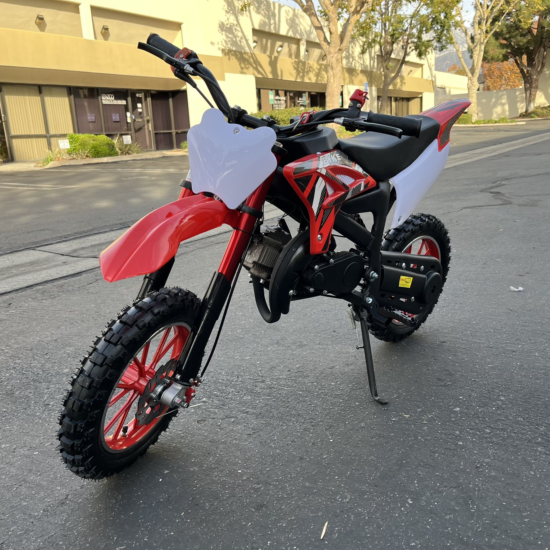 49cc Mini Dirt Bike Pit for Kids 2-Stroke off Road mix weights 135lb, top speed 20mph