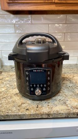 Instant Pot Pro 10-in 1 Pressure Cooker, Rice/Grain Cooker, Steamer, Saute, Sous Vide, Yogurt Maker, Sterilizer,  and Warmer with accessories.