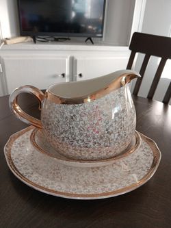 Karol China 22kt Gold Warranted