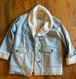 Light blue denim jacket with white fleece  lining size medium