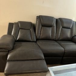 Gray recliner on both sides sofa