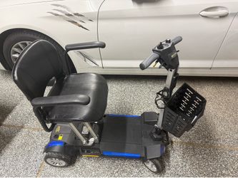 Golden Buzz Around Carryon Mobility Scooter