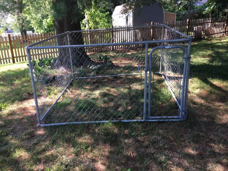 8x8x4 Chain link dog kennel with gate and 2x2 ft opening for a dog house.