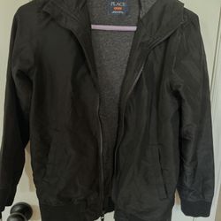 Youth 10-12 Nice Black Jacket with zipper, hood and 2 side pockets. See more below.
