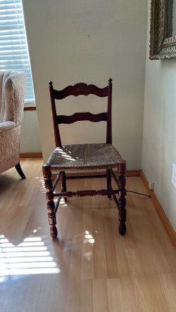 Antique chair with rope seat