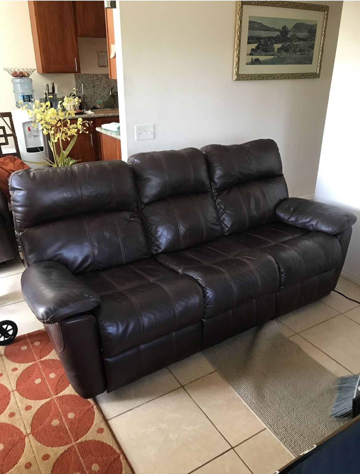 Dual Brown Reclining Couch. PENDING