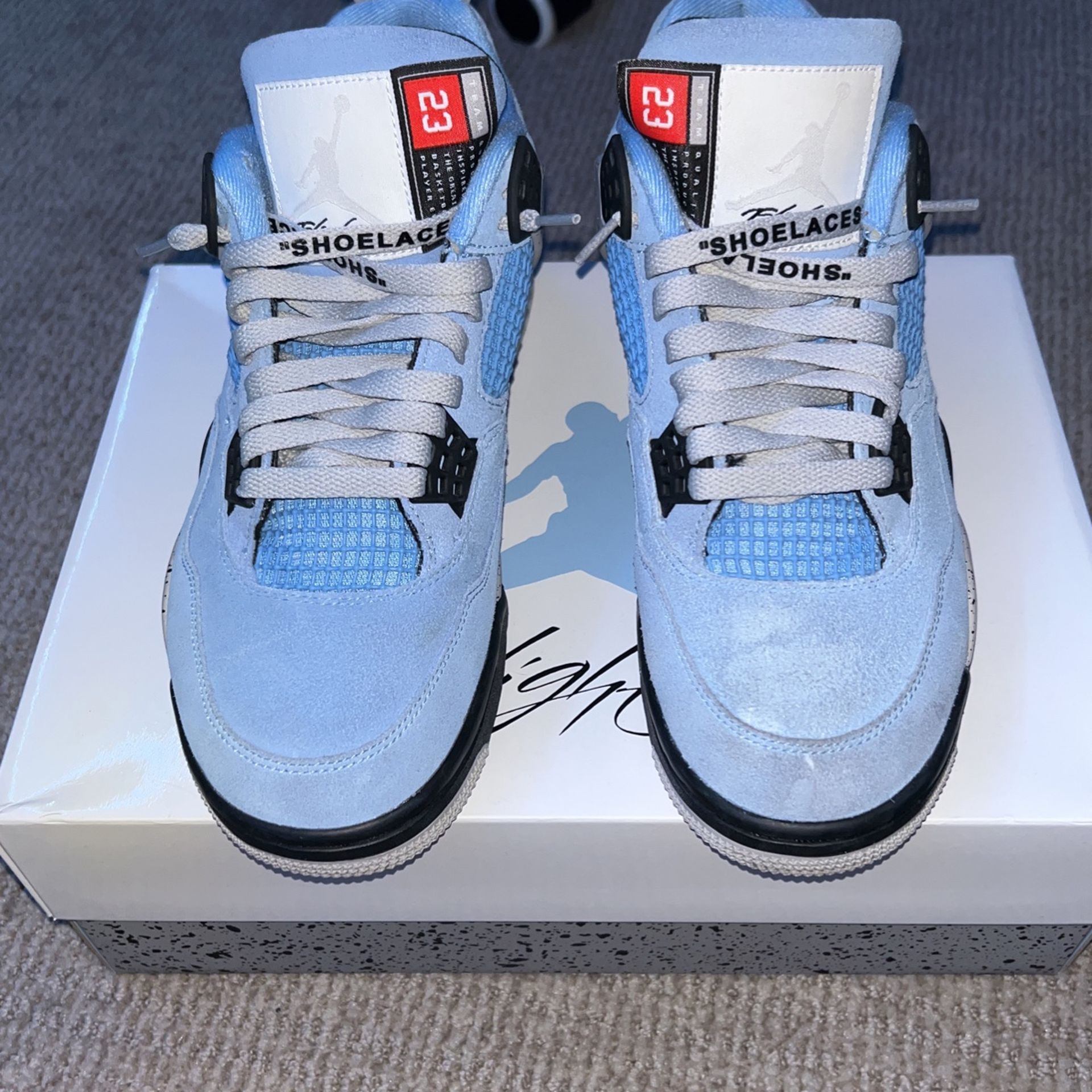 University Blue Jordan 4