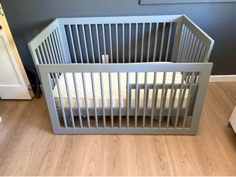 Expensive European crib and changing table from Stokke