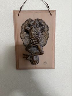 Vintage cast iron wall hanging frog door knocker