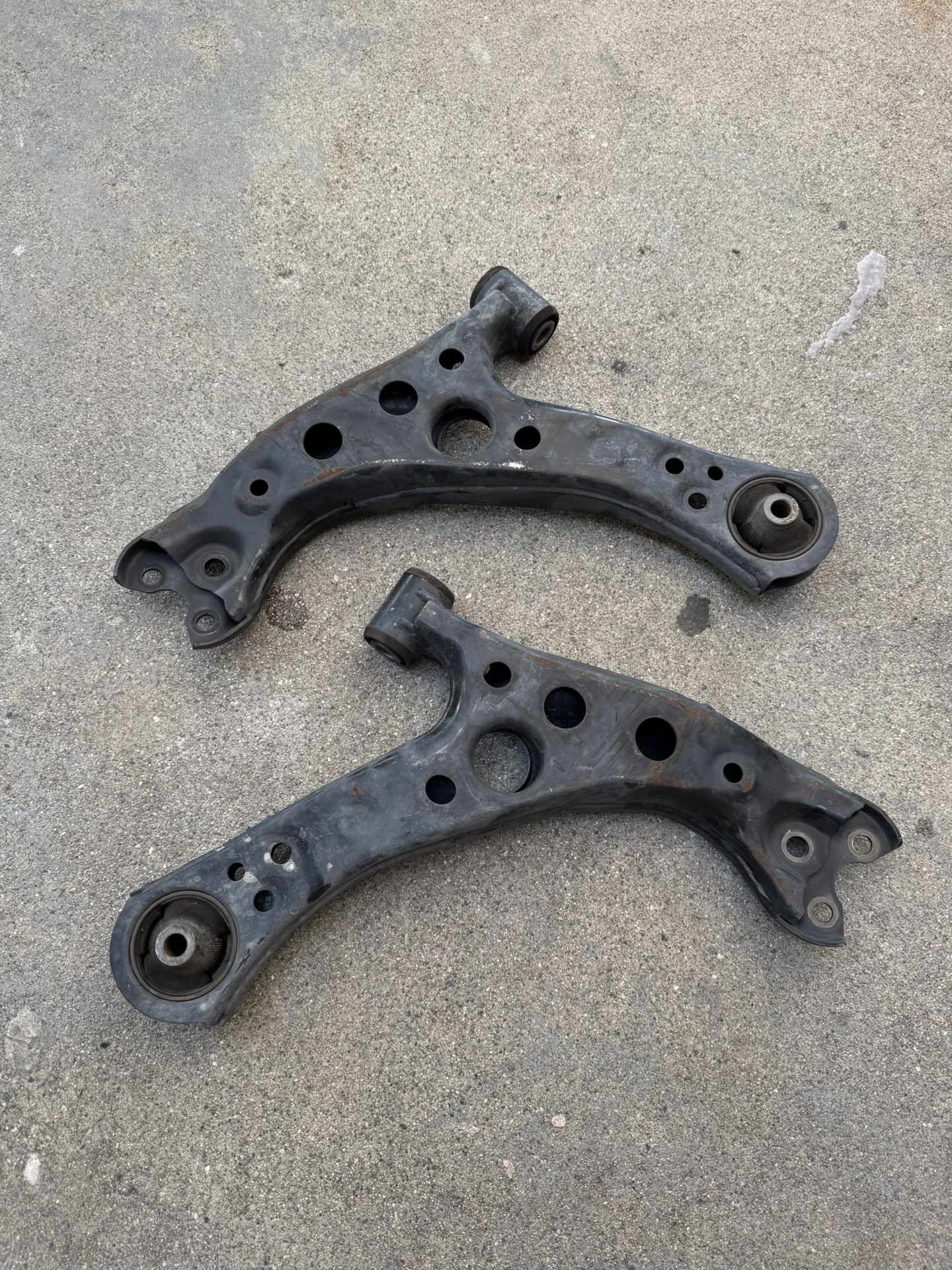 Original 2016-2025 Toyota Prius Prime Front Lower Control Arm - Toyota (48068-02310) Front Right Toyota (48069-02310) Front Left