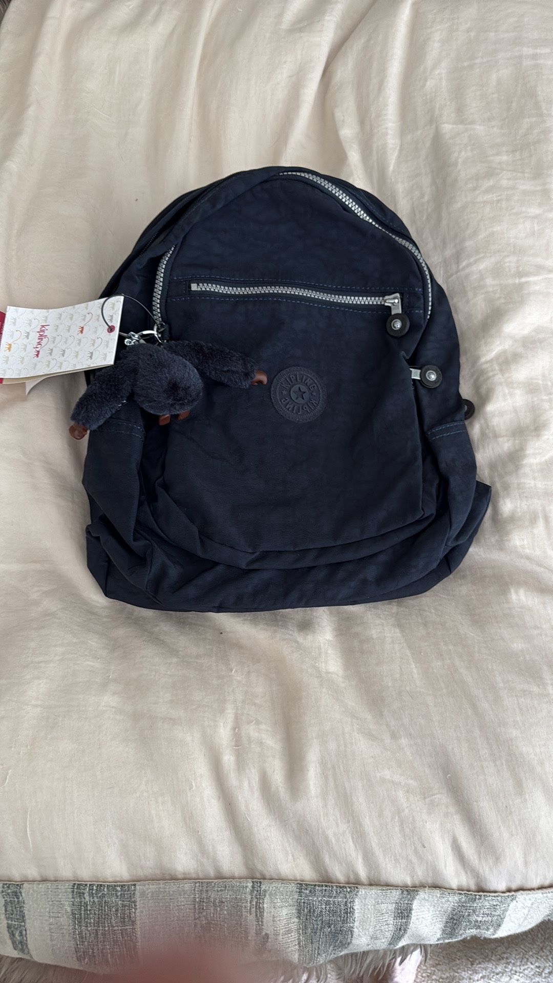 Kipling Blue Backpack with Signature Charm