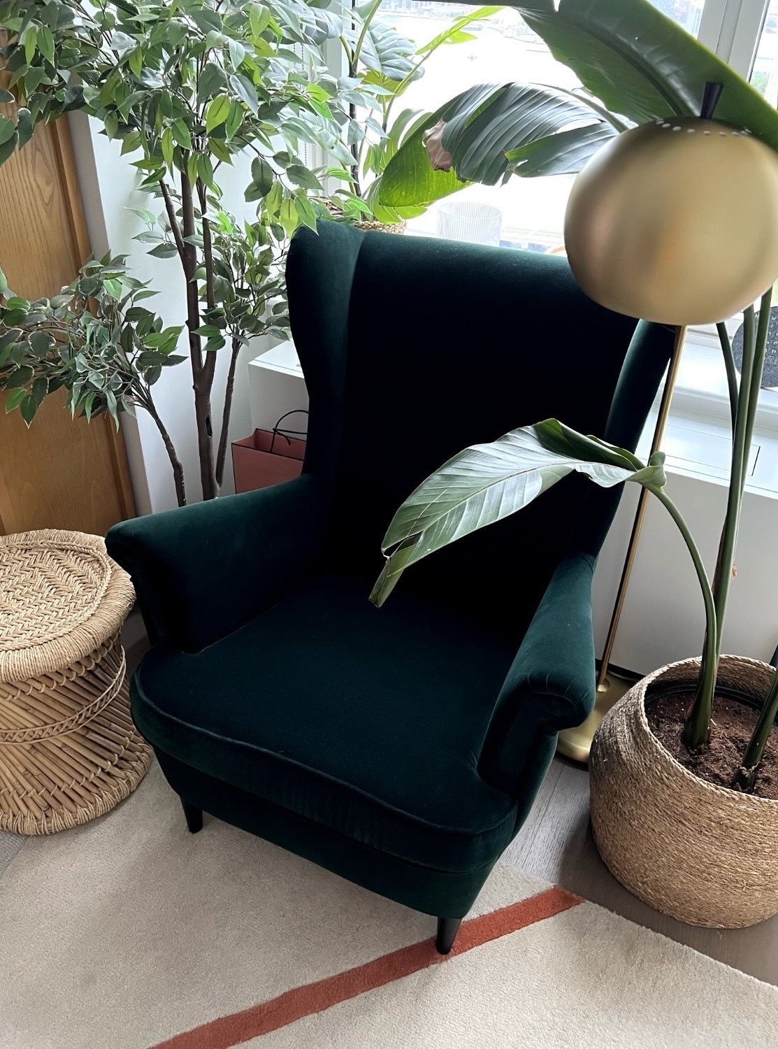 Green velvet armchair