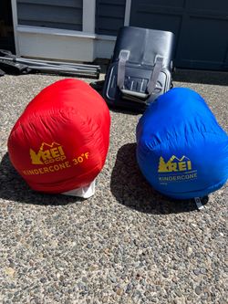 Two REI Kindercone sleeping bags