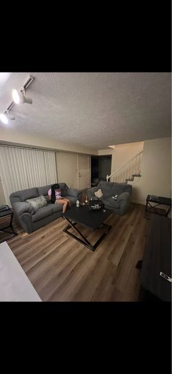 Living room set Love seat and couch with table
