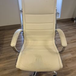 White office chair, adjustable height, chrome base with wheels. Some wear on seat and armrests but fully functional and comfortable. Pickup only.