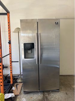 Samsung 24.5 cu. ft. Side-by-Side Refrigerator in Stainless Steel.