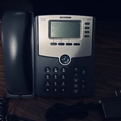 The Cisco SPA514G is a professional 4-line VoIP phone