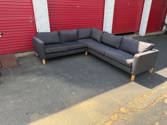 Nice gray sectional (free delivery)