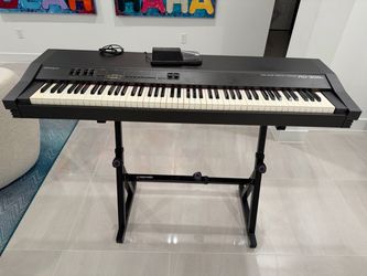 Roland RD300s and anvil case on wheels