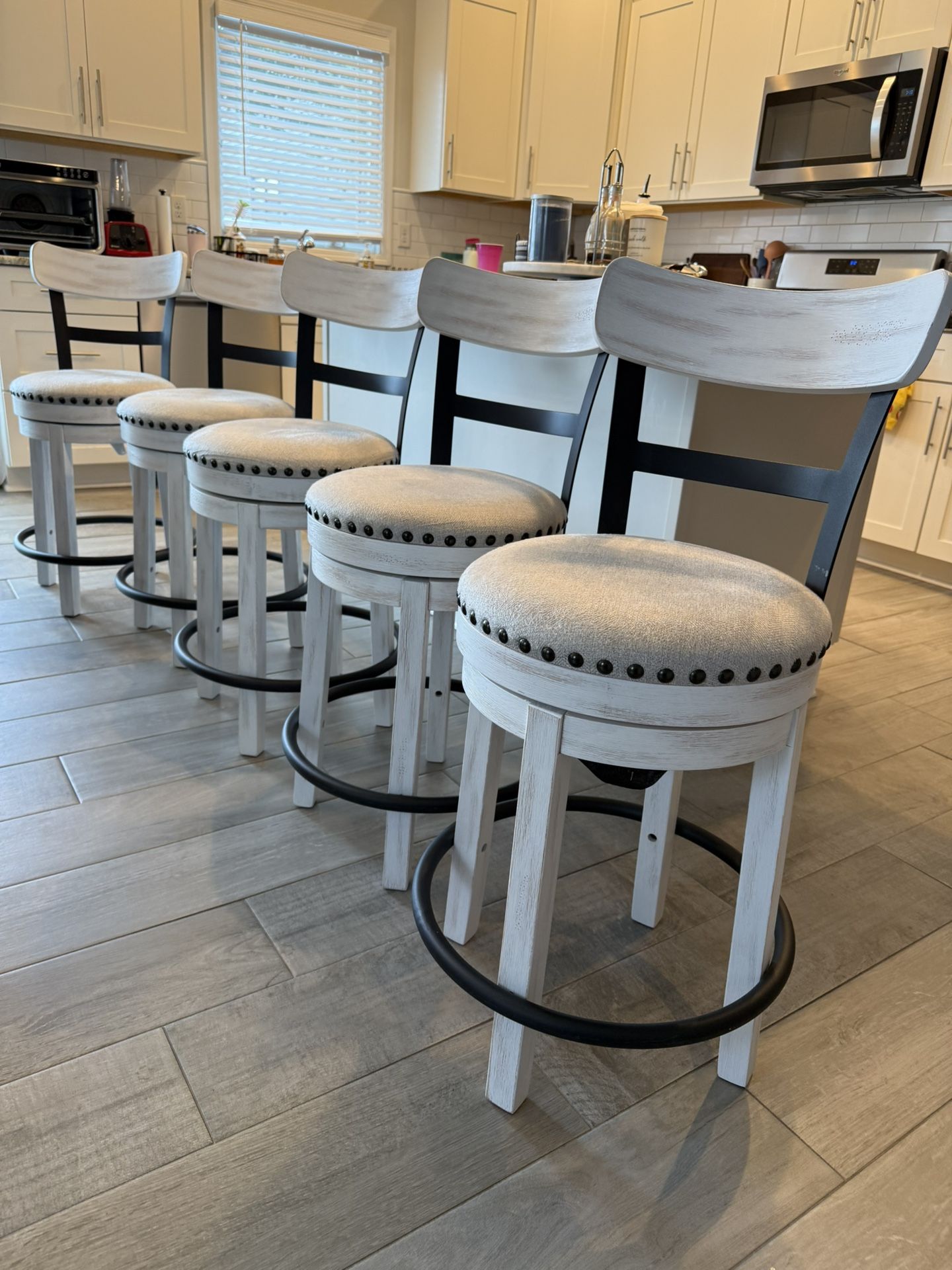 A set of (5) counter stools