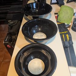 Three black bowls