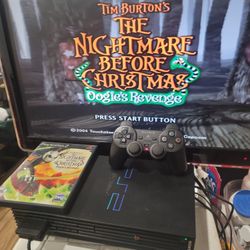 PLAYSTATION 2 WITH NIGHTMARE BEFORE CHRISTMAS GAME (RARE )CIB