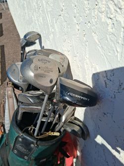 2 Complete sets of professional golf clubs