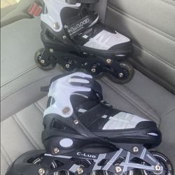 Rollerblades adjustable size 2-5, fit shoe size 2, 3, 4, 5