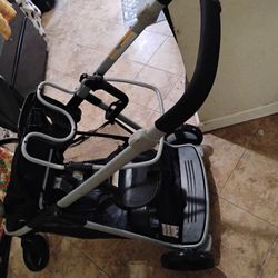Stroller Holds  Two Semi New