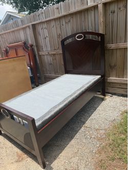 Twin size bed frame with box spring,,, mattress it’s free