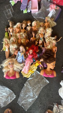 more than 26 barbie dolls and clothes all for 50
