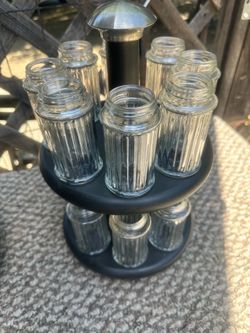 Spice rack w/ jars. Just need lids.-$5 Cash Only. Pick-Up in Clovis. No Delivery